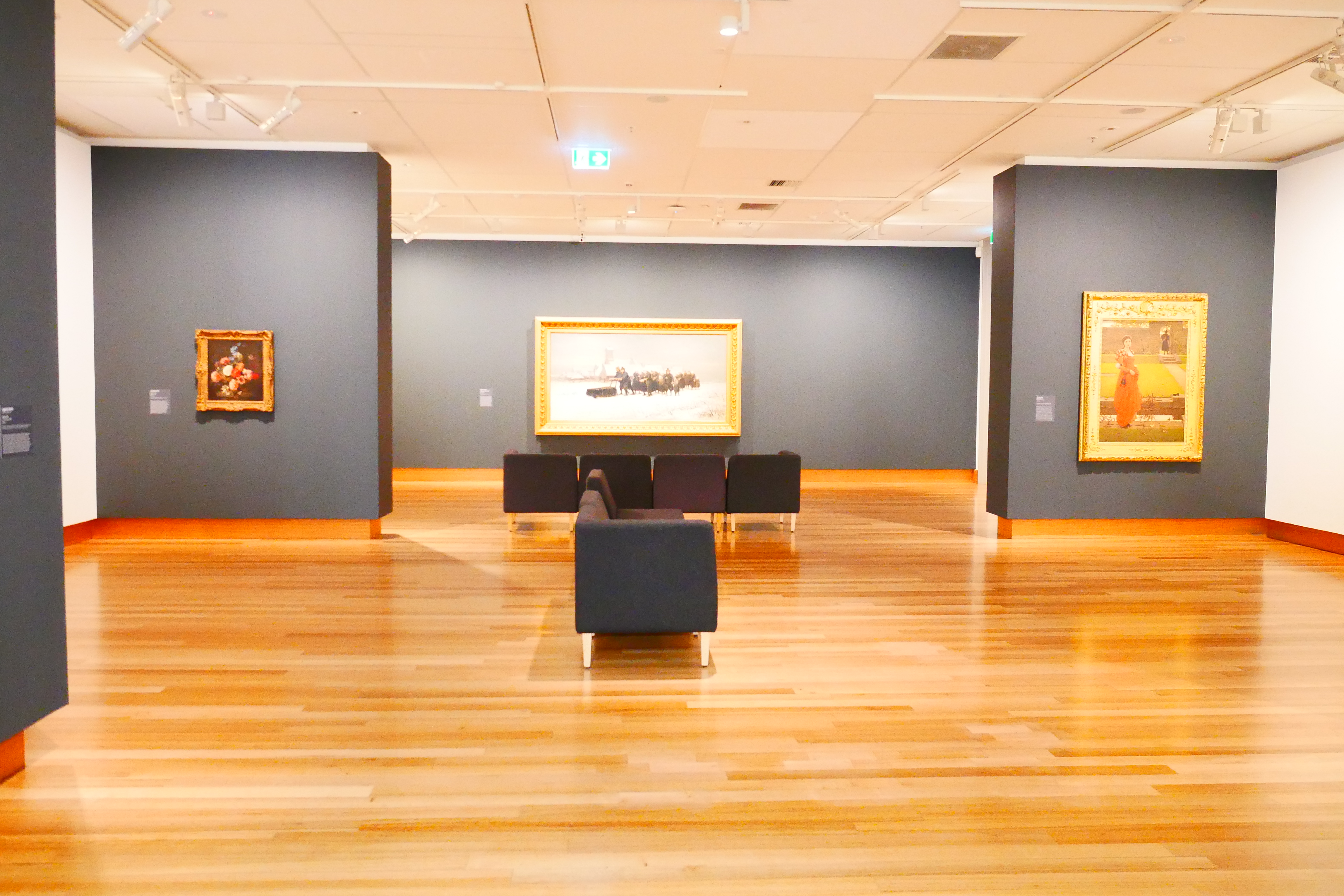 Interior of Christchurch Art Gallery with framed artworks and a bright exhibition space