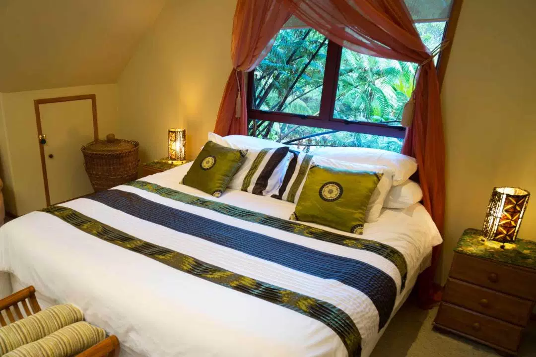 Bright master suite with a large bed and soft linens